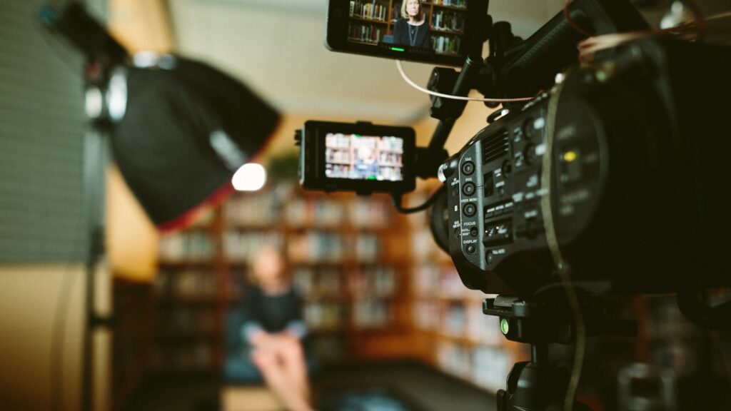Golf club marketing: camera filming audiovisual content